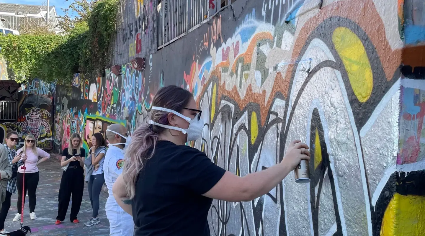 tms employees participating in legal Graffiti art on the streets of London